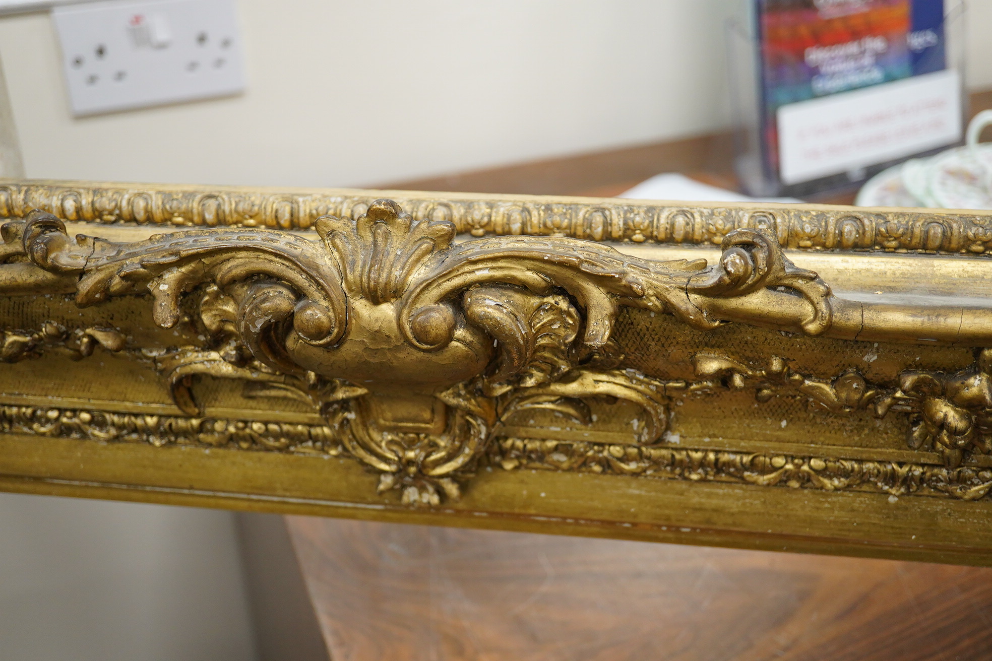 A 19th century ornate gilt picture frame, aperture size 74 x 60cm. Condition - fair, minor losses